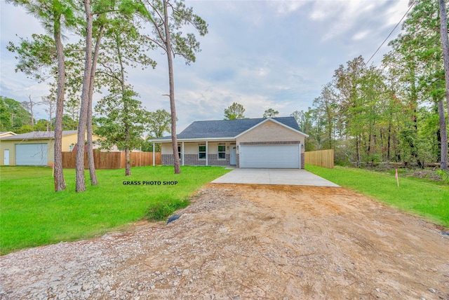 448 Brahman, Onalaska, TX 77360 - single story home featuring driveway, covered porch, a garage, and brick siding
