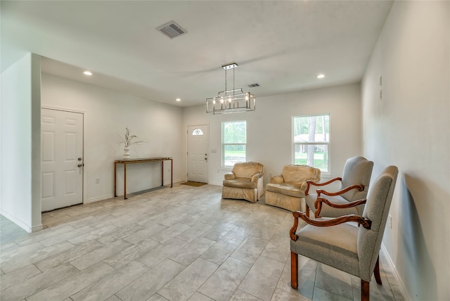 living room with a chandelier