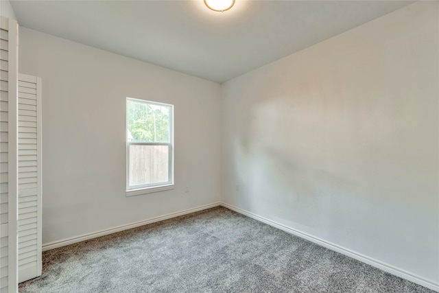 empty room with carpet flooring