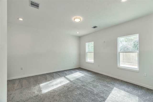 448 Brahman, Onalaska, TX 77360 - spare room featuring carpet flooring and recessed lighting