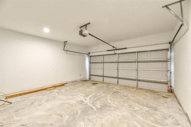 garage featuring a garage door opener