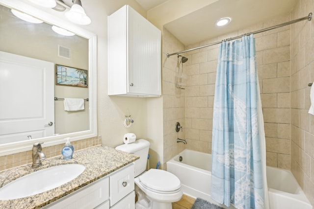 full bathroom featuring vanity, tasteful backsplash, tile patterned flooring, toilet, and shower / bathtub combination with curtain