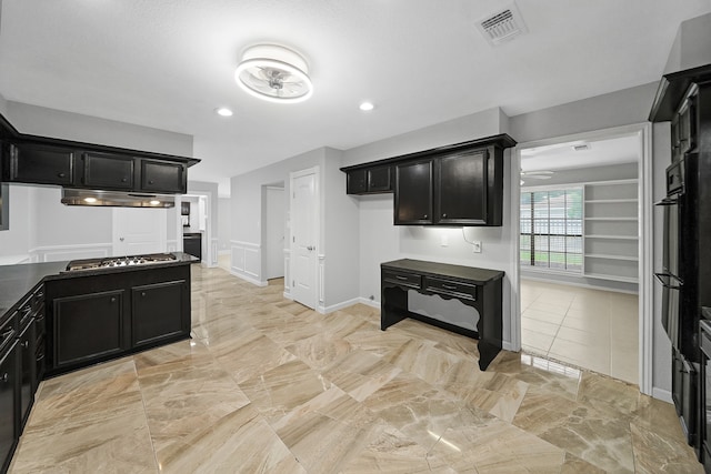 kitchen with ceiling fan and stainless steel gas stovetop