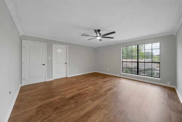 spare room with ceiling fan, wood-type flooring, and ornamental molding