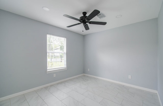 unfurnished room featuring ceiling fan