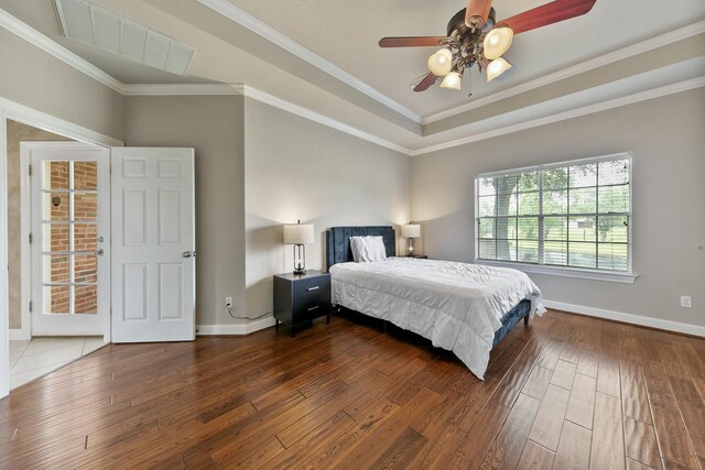 bedroom featuring crown molding, ceiling fan, and hardwood / wood-style flooring