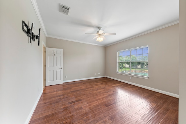 unfurnished room with dark wood-type flooring, ceiling fan, and ornamental molding