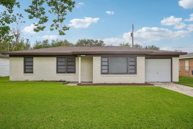 ranch-style home with a garage and a front yard