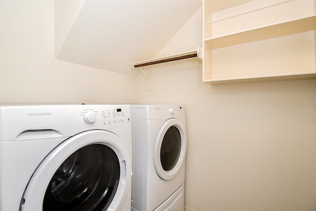 laundry area with washer and dryer