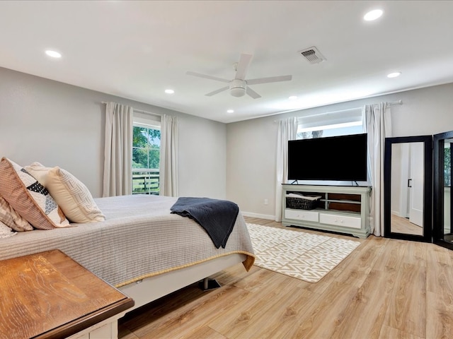 bedroom featuring ceiling fan and light wood-type flooring