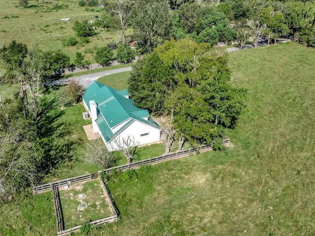 birds eye view of property with a rural view