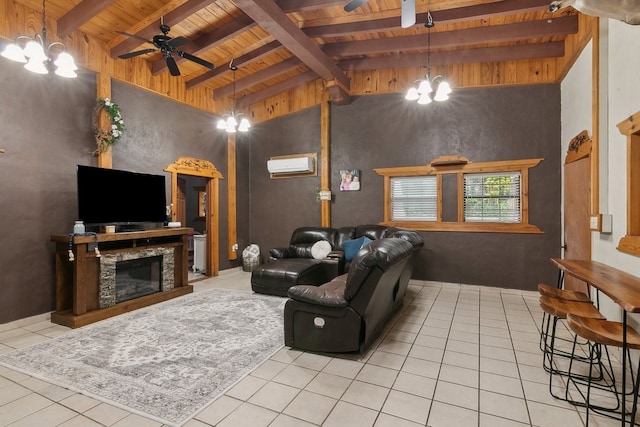 tiled living room featuring an AC wall unit, ceiling fan with notable chandelier, lofted ceiling with beams, and a fireplace