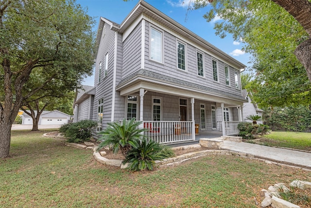 view of front facade featuring a porch and a front yard