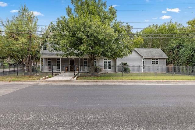 view of front of property featuring covered porch