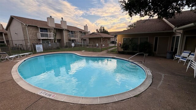 1505 Ward Rd Unit 214, Baytown, TX 77520 - community pool featuring fence and a patio area