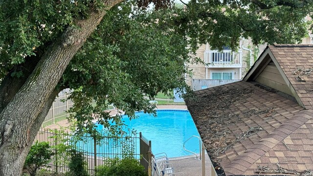 1505 Ward Rd Unit 214, Baytown, TX 77520 - view of pool with a fenced in pool and fence