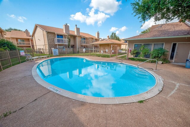 1505 Ward Rd Unit 214, Baytown, TX 77520 - pool with a patio and fence
