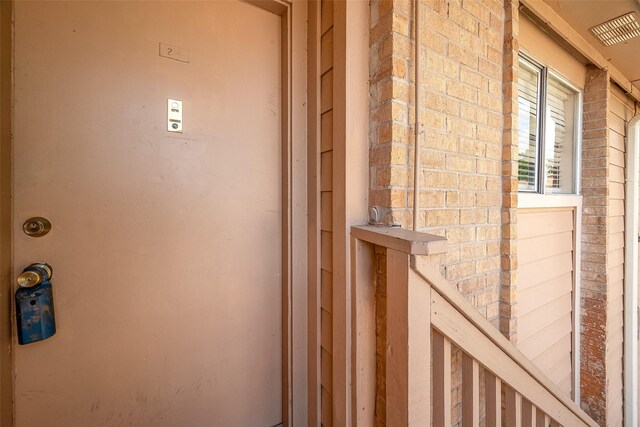 1505 Ward Rd Unit 214, Baytown, TX 77520 - exterior details featuring brick siding and visible vents