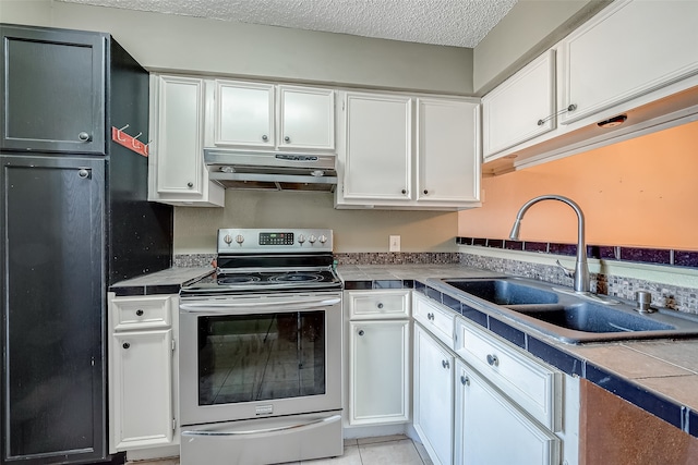 kitchen featuring white cabinets, sink, a textured ceiling, tile countertops, and stainless steel electric stove