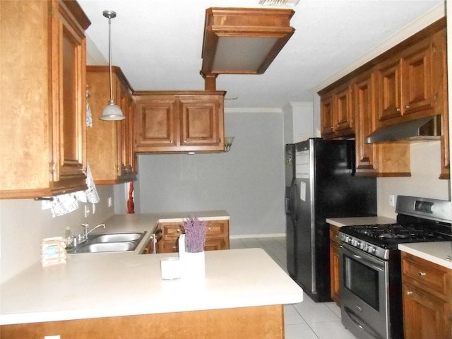 kitchen featuring hanging light fixtures, sink, kitchen peninsula, extractor fan, and stainless steel range with gas stovetop