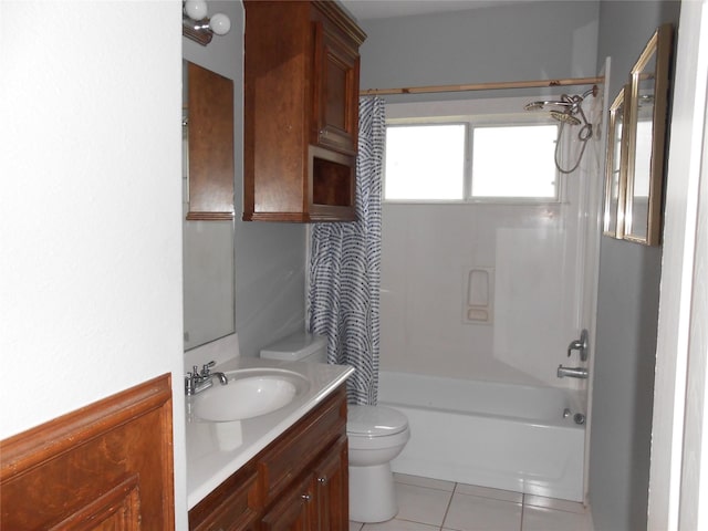 full bathroom with shower / bath combination with curtain, vanity, toilet, and tile patterned floors