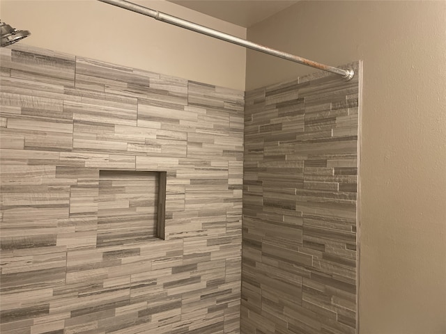 interior space with a tile shower