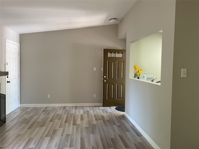 entryway with light hardwood / wood-style floors