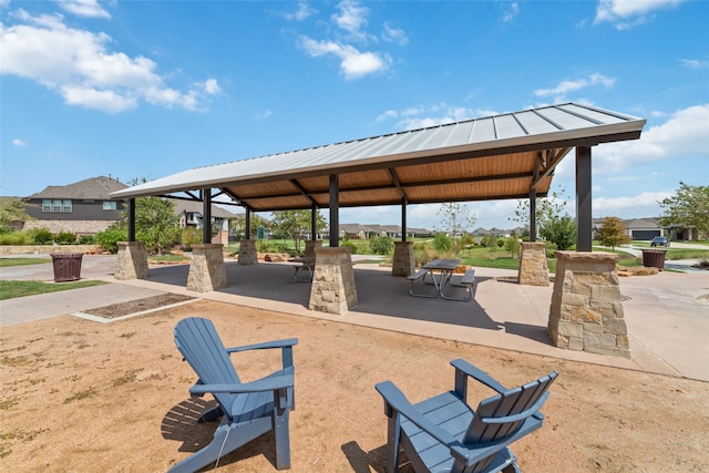 surrounding community featuring a patio and a gazebo