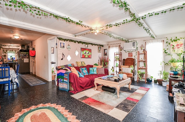 living room with plenty of natural light and a wall unit AC