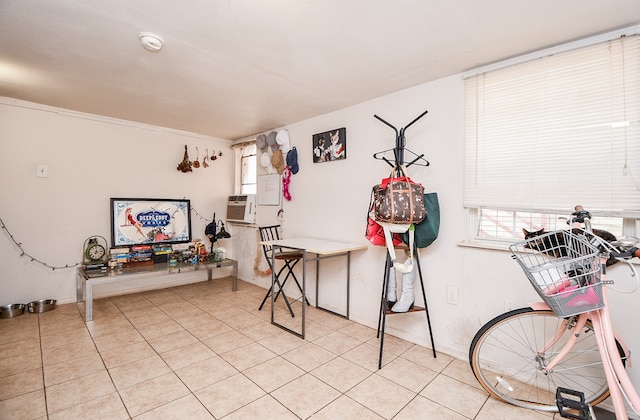 misc room with cooling unit and light tile patterned flooring