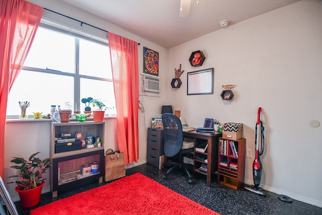 office space with a wealth of natural light and ceiling fan