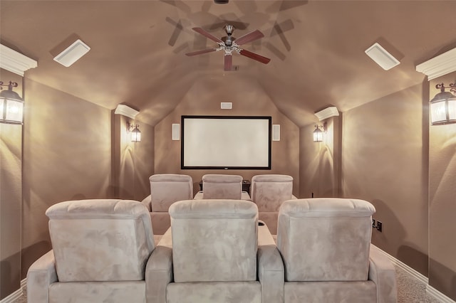 carpeted home theater with lofted ceiling and ceiling fan