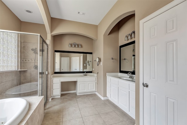 bathroom with vanity, plus walk in shower, and tile patterned floors