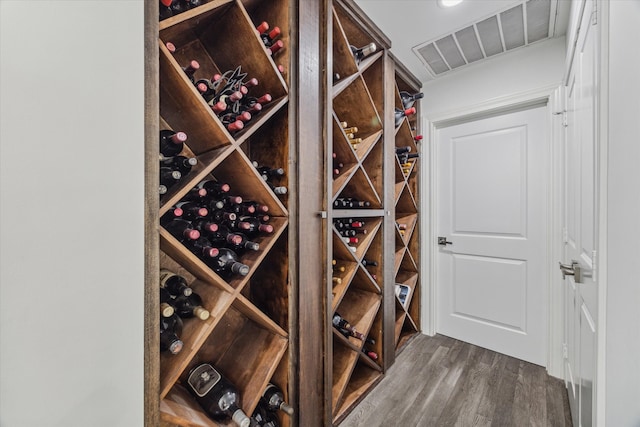 wine room featuring hardwood / wood-style flooring