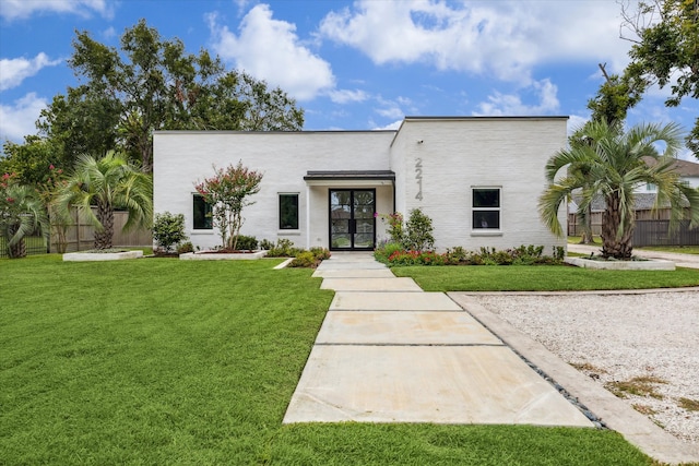 view of front of house with a front lawn