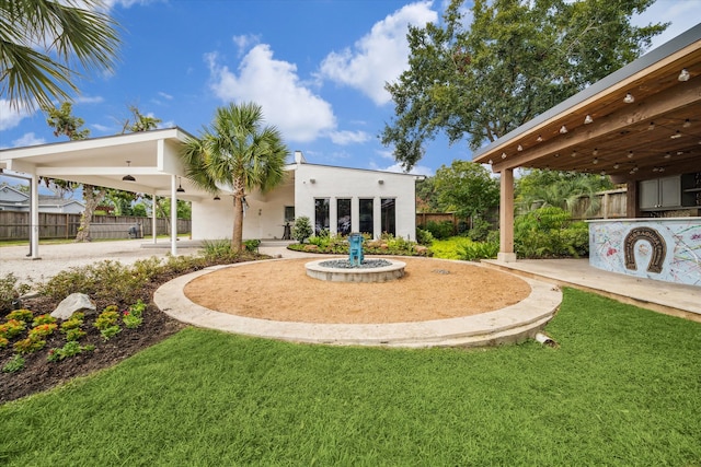 surrounding community featuring a yard and a patio area