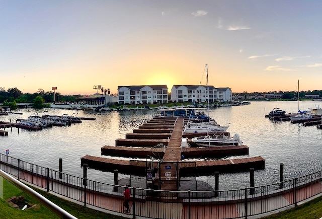 dock area featuring a water view