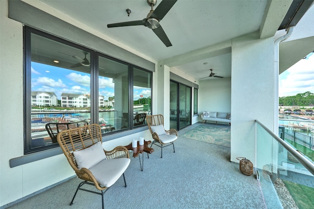 exterior space featuring ceiling fan