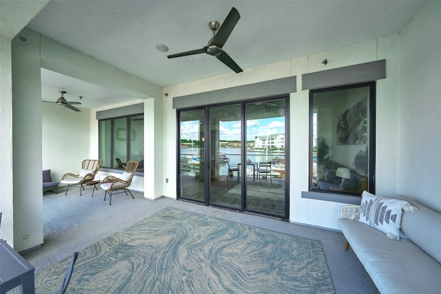 view of patio featuring ceiling fan