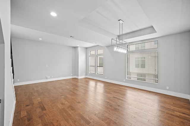 empty room featuring hardwood / wood-style floors