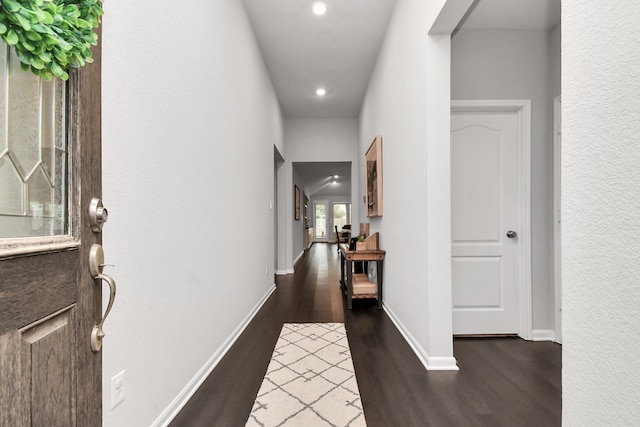 hallway featuring wood-type flooring