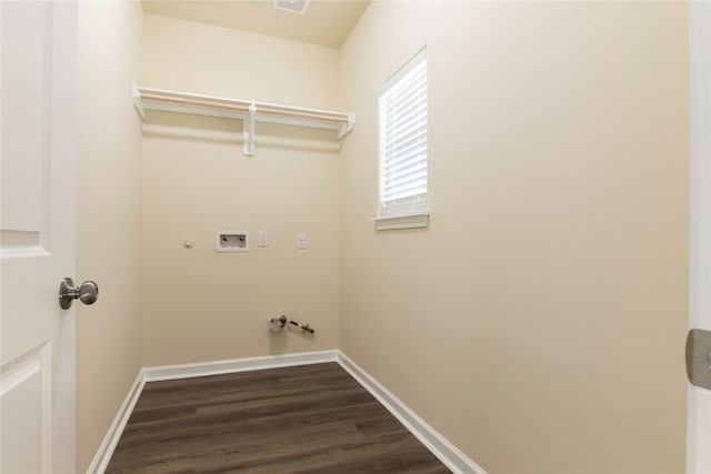 laundry room with washer hookup, dark hardwood / wood-style flooring, and gas dryer hookup