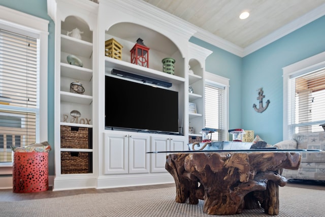 living room with ornamental molding