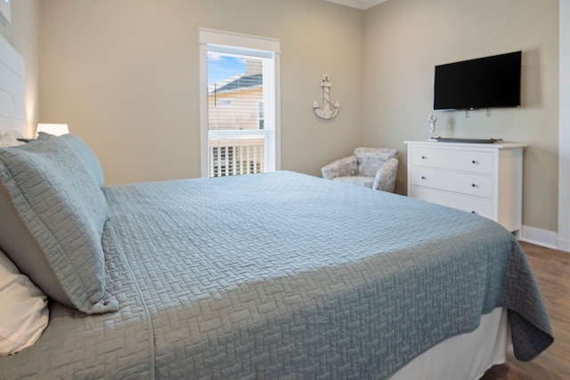 bedroom with wood-type flooring