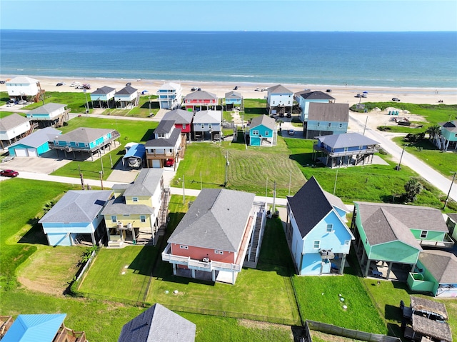 aerial view with a view of the beach and a water view