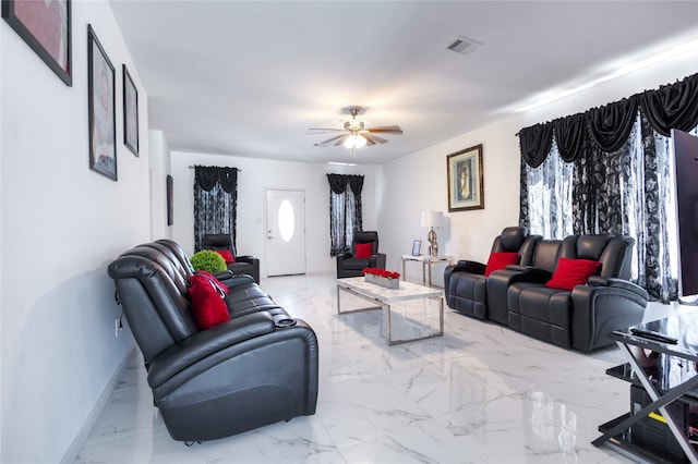 living room featuring ceiling fan