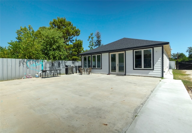 rear view of property with a patio area