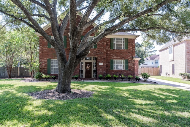 view of front of home featuring a front lawn