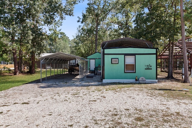 exterior space featuring a carport