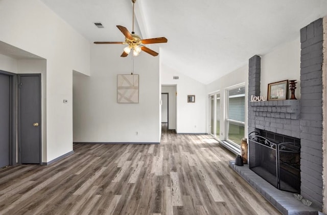 unfurnished living room featuring high vaulted ceiling, hardwood / wood-style floors, ceiling fan, and a fireplace